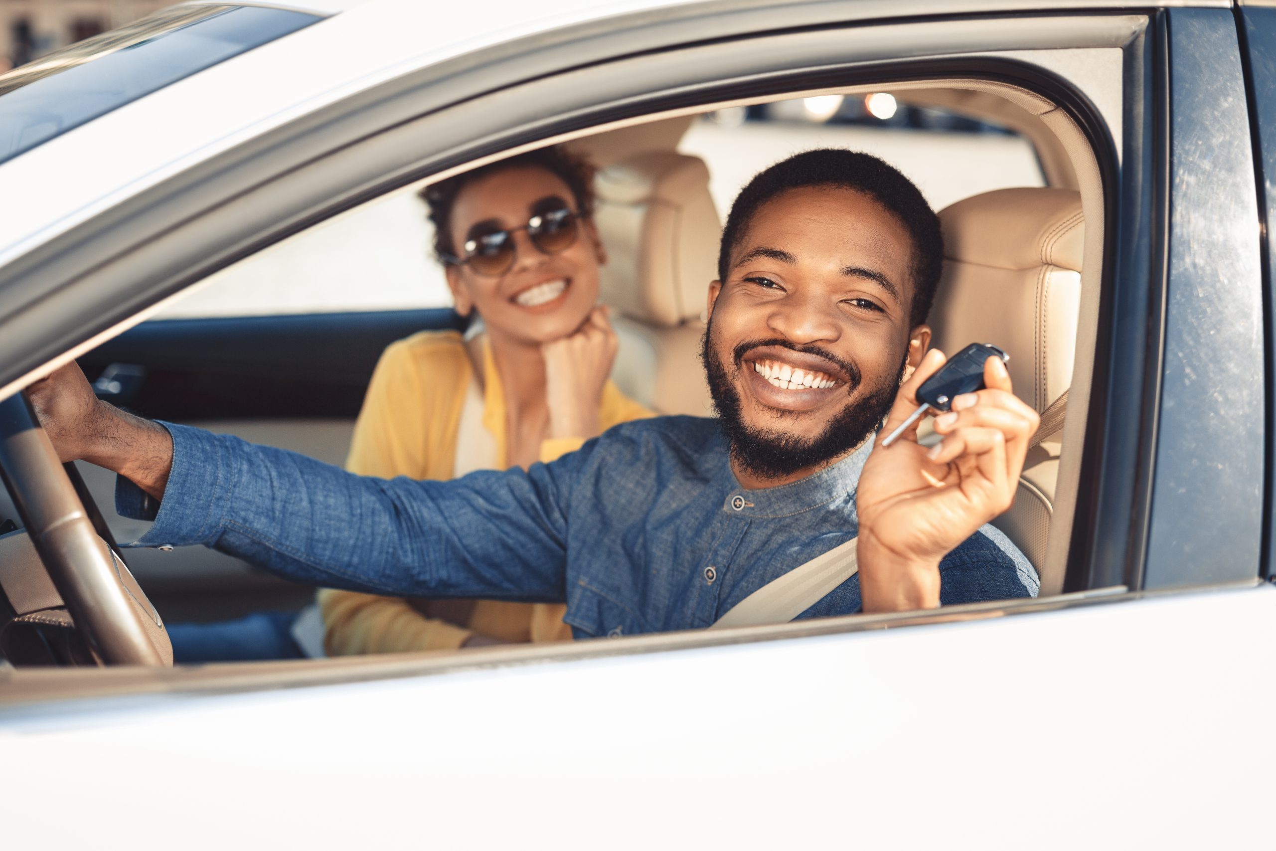 Man holding car key